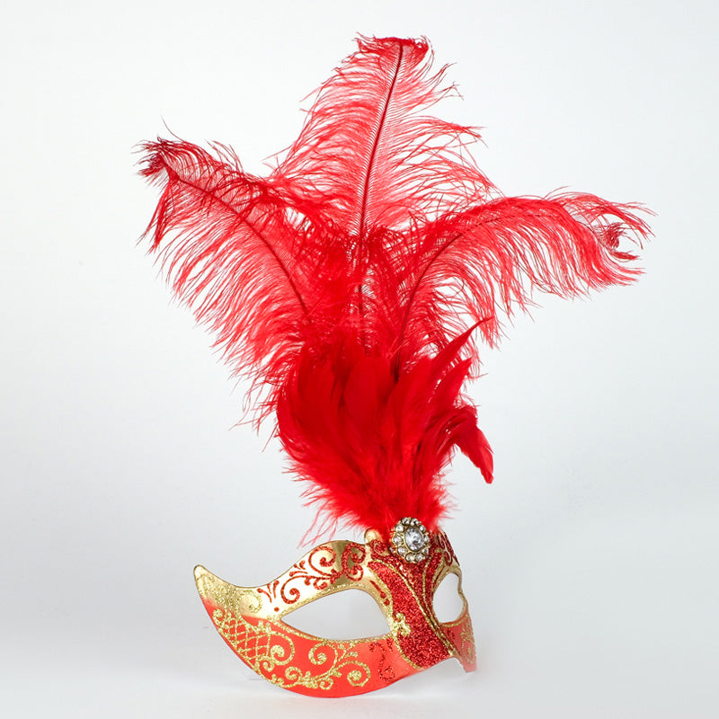 Angled view of Colombina Piume Stella Gold Red Venetian feather mask